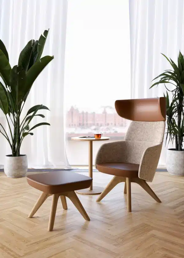 WINX lounge armchair with elegant upholstered shell and metal base
