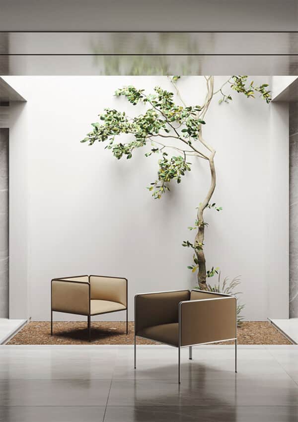 Elegant brown lounge chairs with metal legs for Malta interiors
