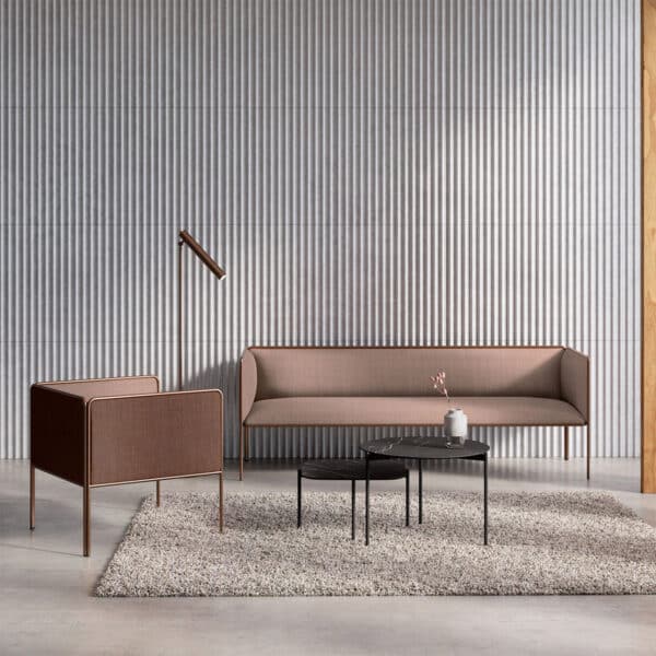 Modern brown sofa seating with a coffee table for Malta offices