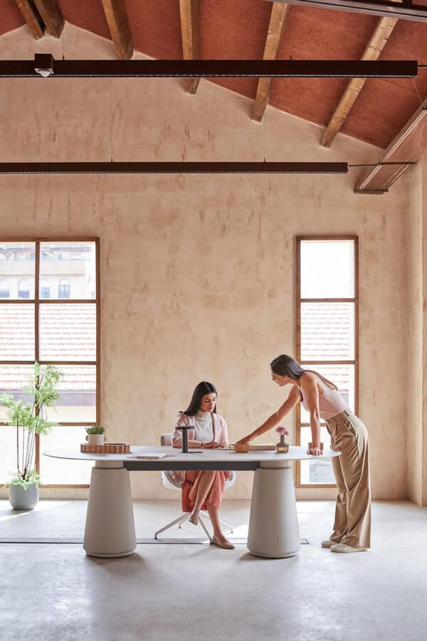 Office chairs and conference table in team workspace Malta