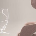 Sandie lounge chair with high-back upholstered design in a modern interior