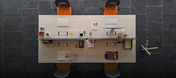 Top view of the VITAL Plus bench desk system with integrated workspace organization